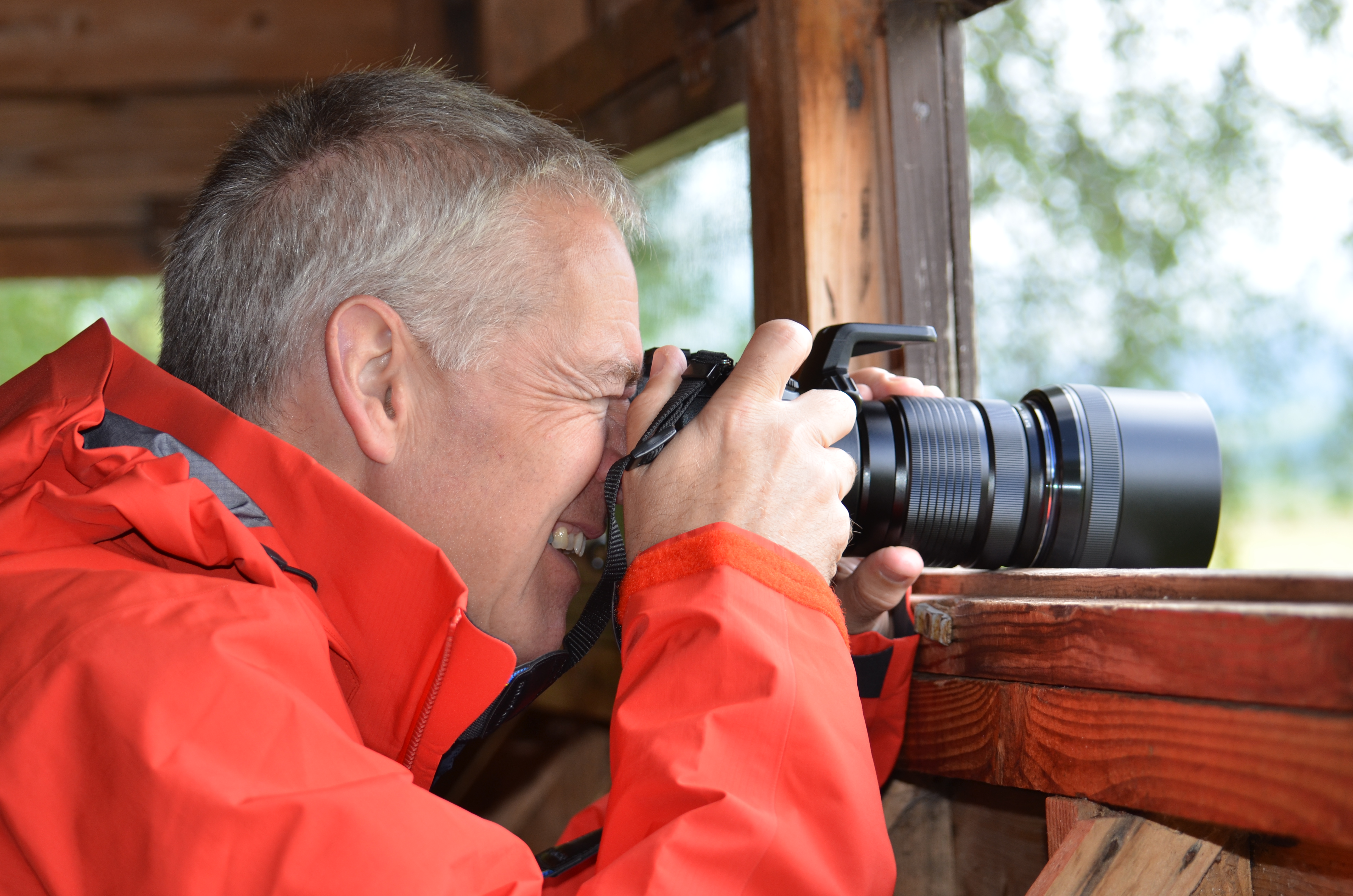 Nick taking photographs with a SLR camera