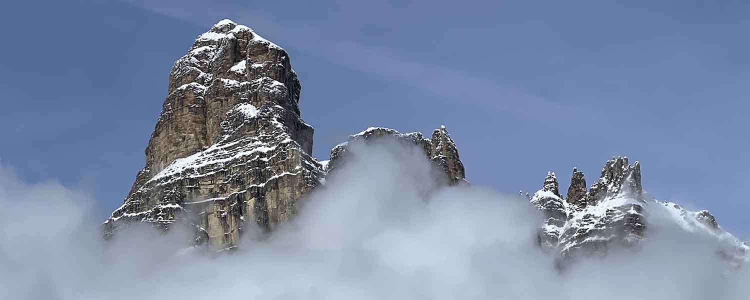Dolomites mountains encased in a swirl of cloud